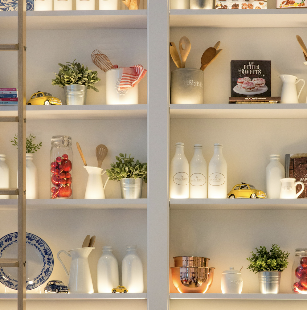 Organized kitchen pantry with neatly arranged shelves
