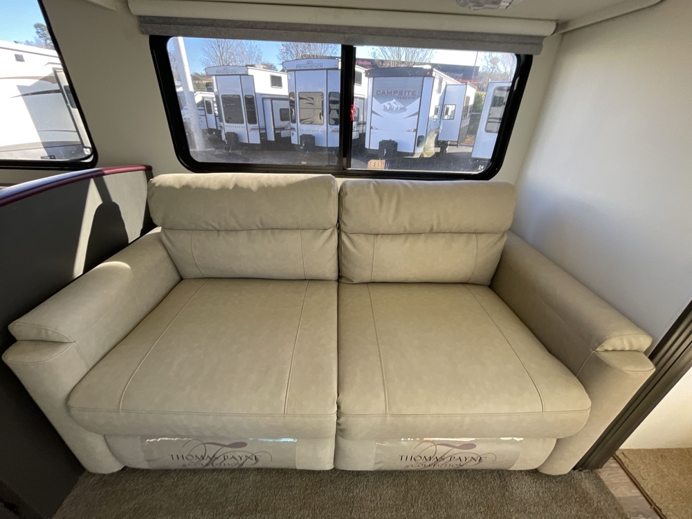 Hide-a-bed sofa with self-inflating queen air mattress