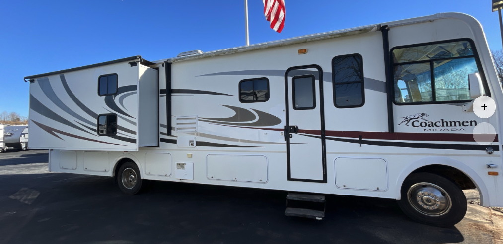Door side view of 2012 Coachmen Mirada 34BH