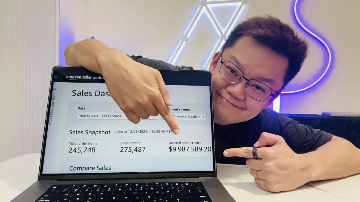 Amazon Seller Central dashboard showing $9,987,589.20 in total sales with Willy pointing at the screen - proof of the $9.9M revenue claim