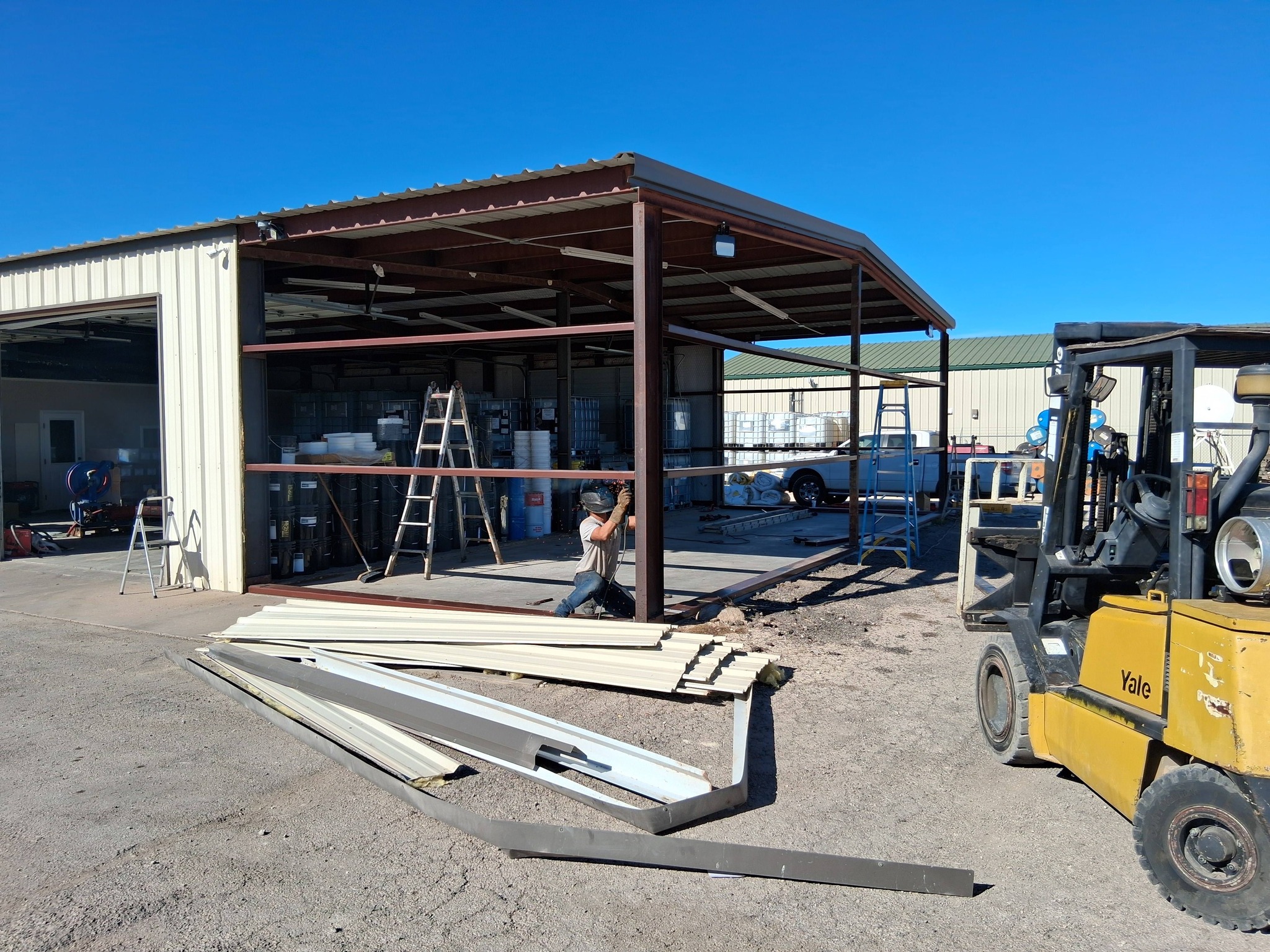 Metal building construction in progress - Angelo Arbor Co San Angelo TX
