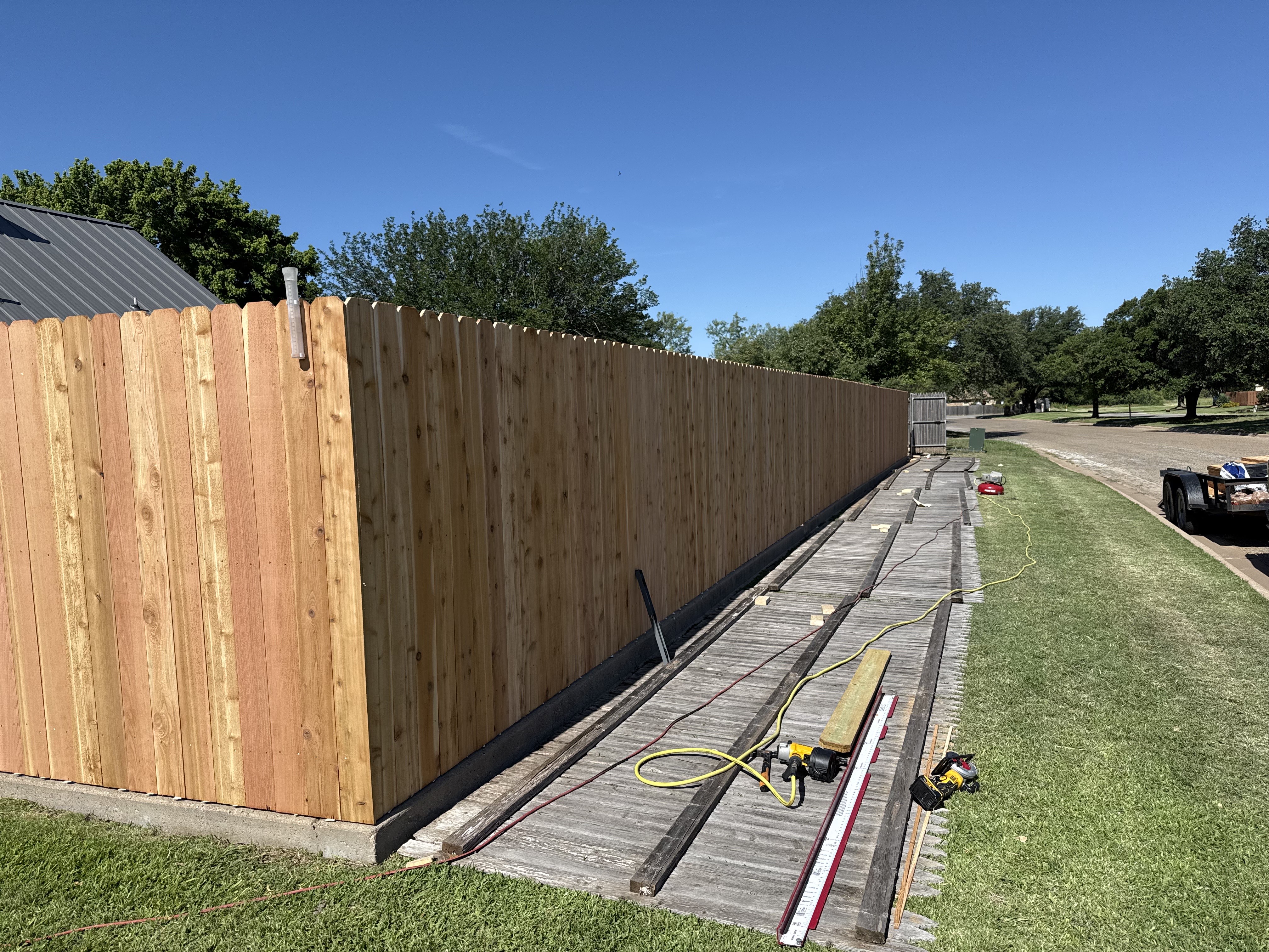 Privacy fence installation in progress