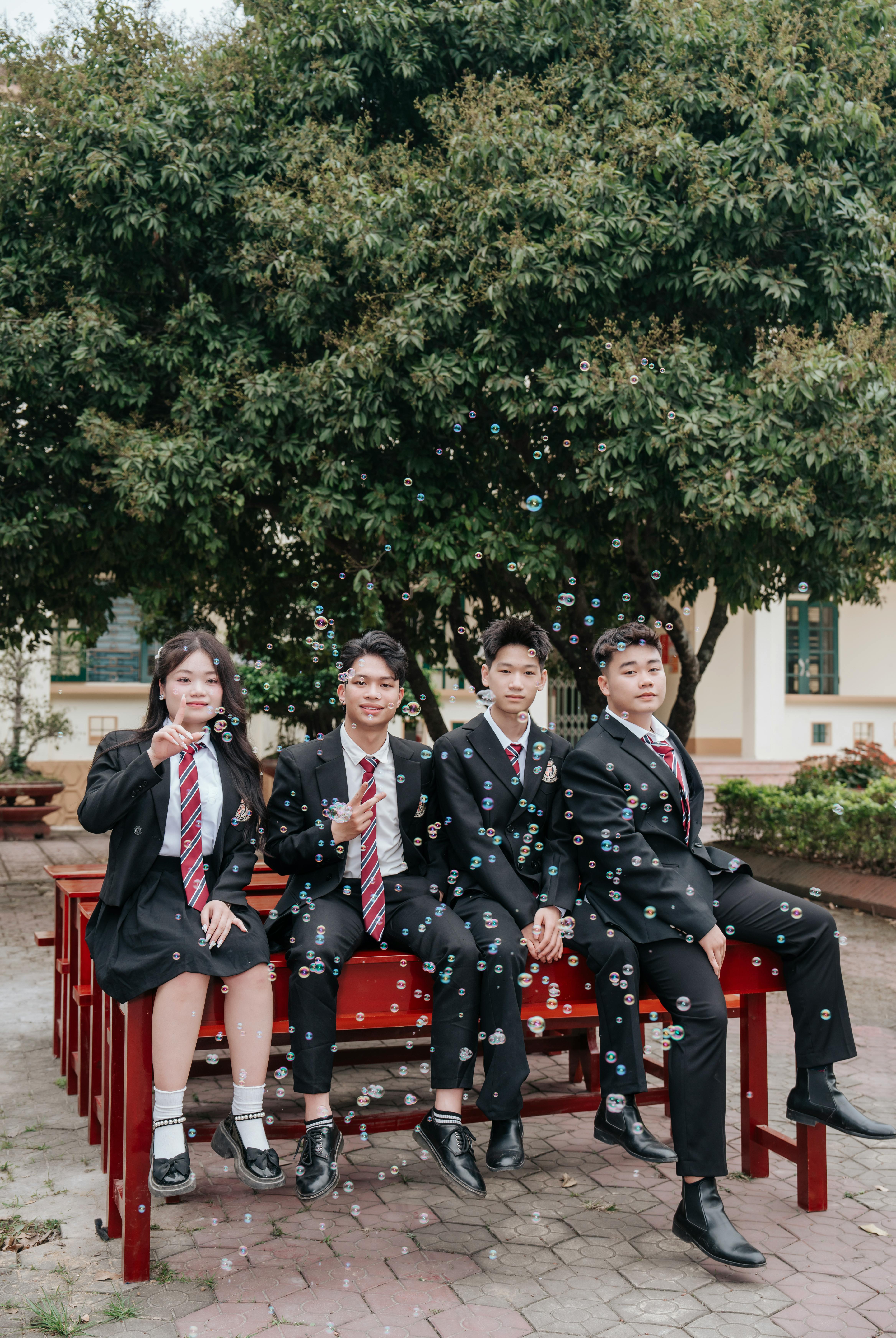 Students outdoors in blazers