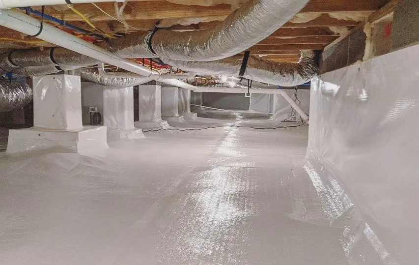 Crawlspace moisture control and encapsulation barrier installation in New Bern NC