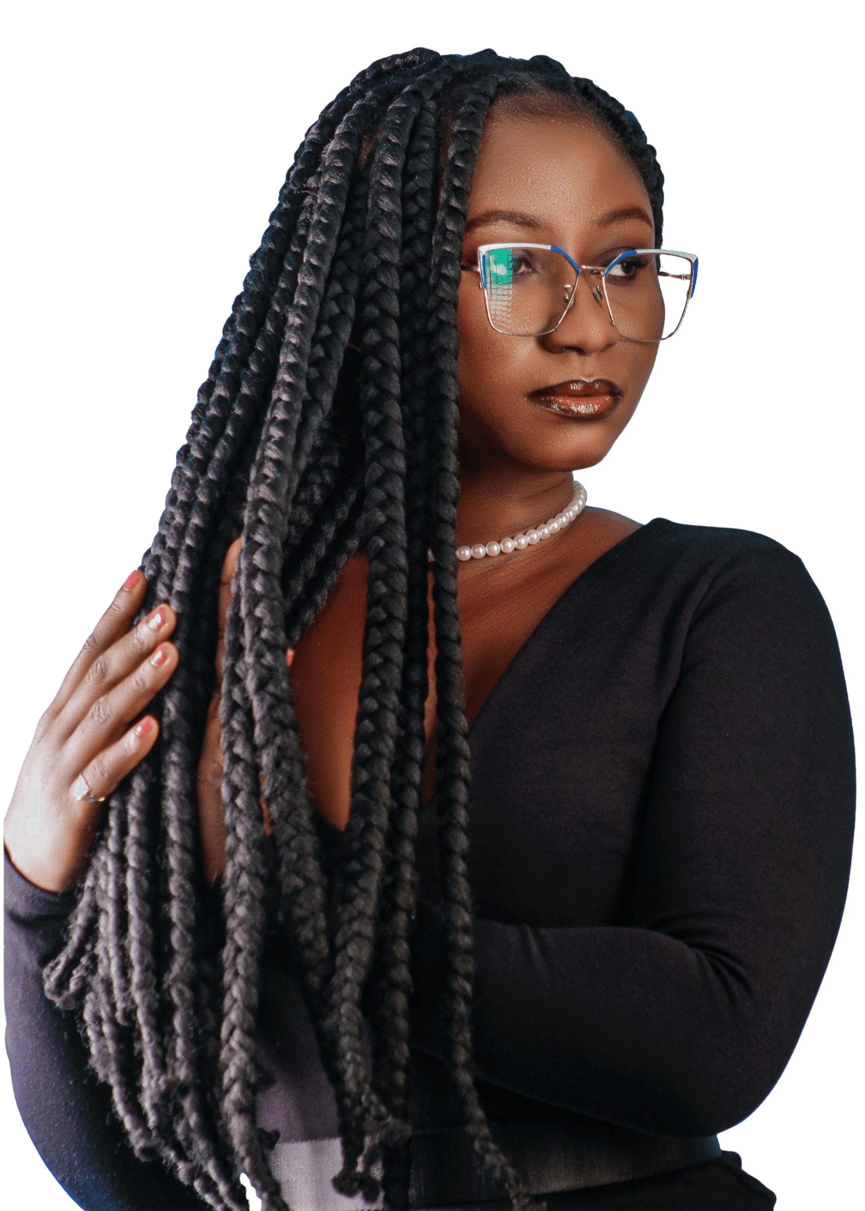 Professional Black woman with braided locs wearing glasses and business attire, embodying confidence and entrepreneurial leadership
