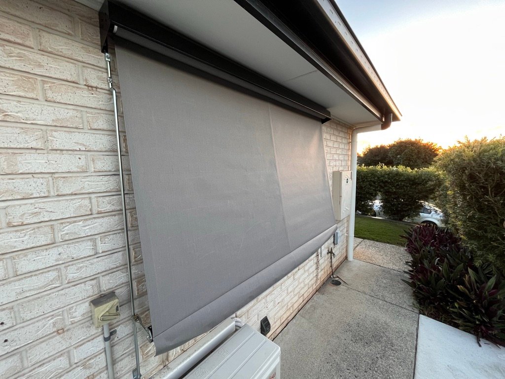 Fixed guide awning with grey mesh, side view