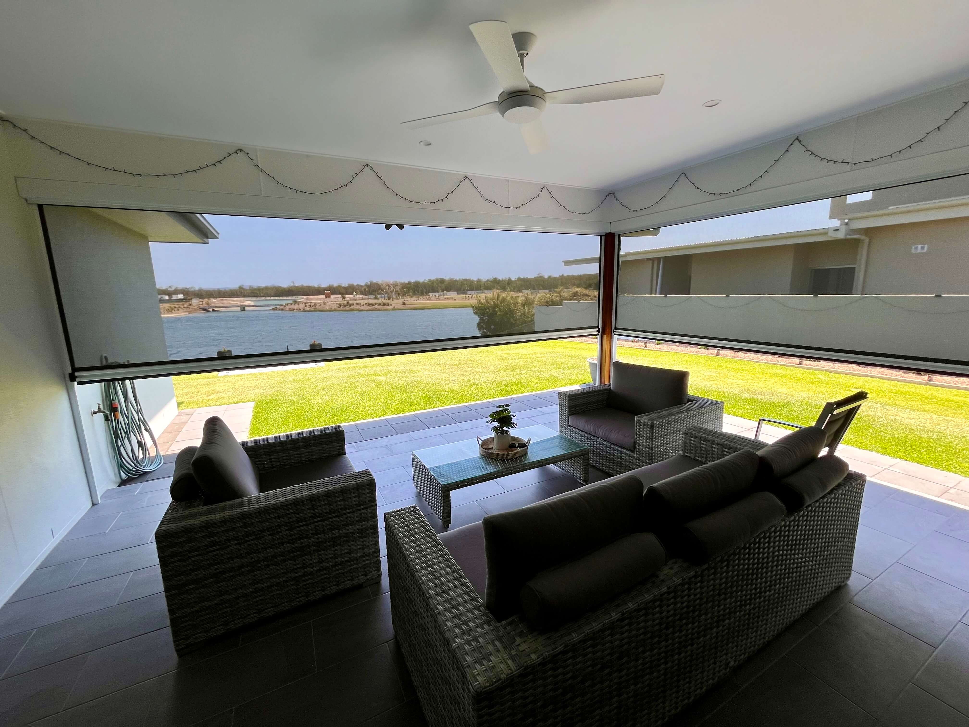 Ziptrak outdoor blinds on waterfront patio