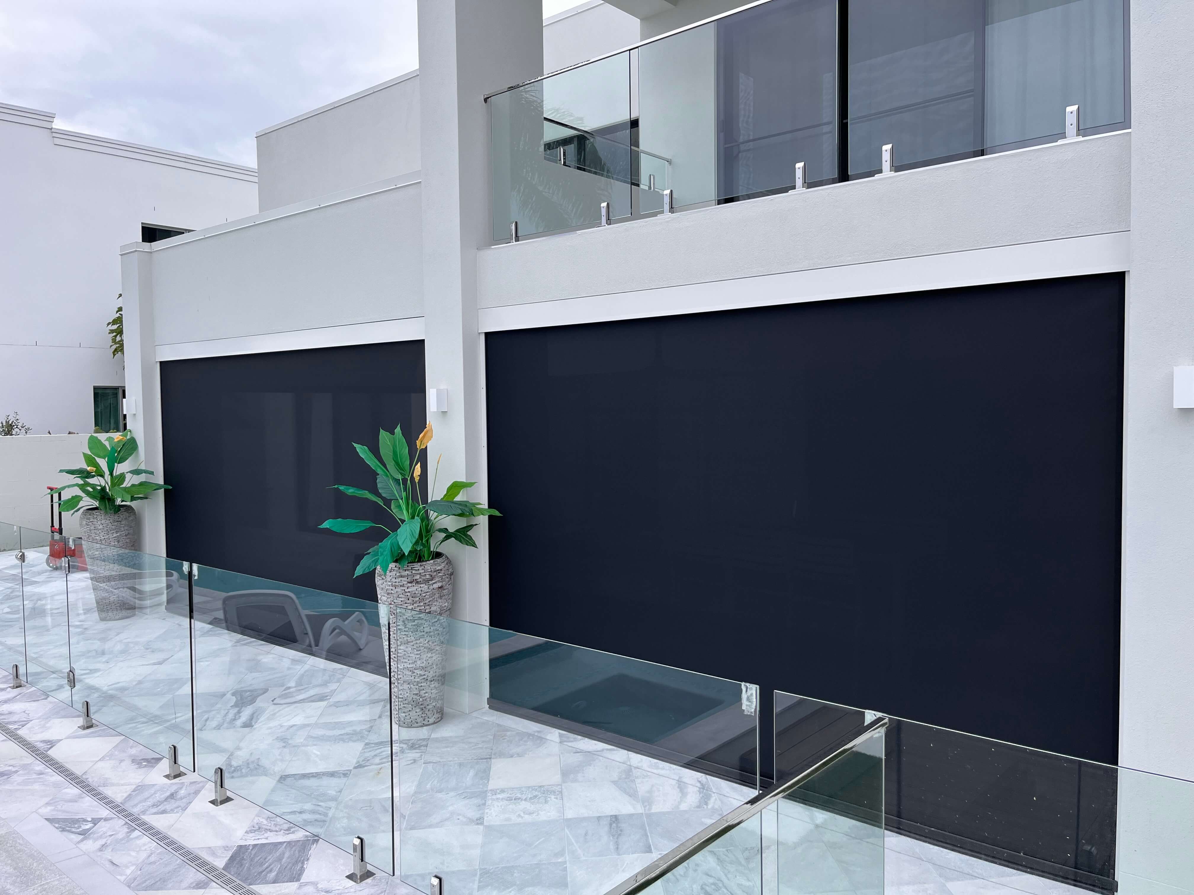 Ziptrak outdoor blinds installed on modern home