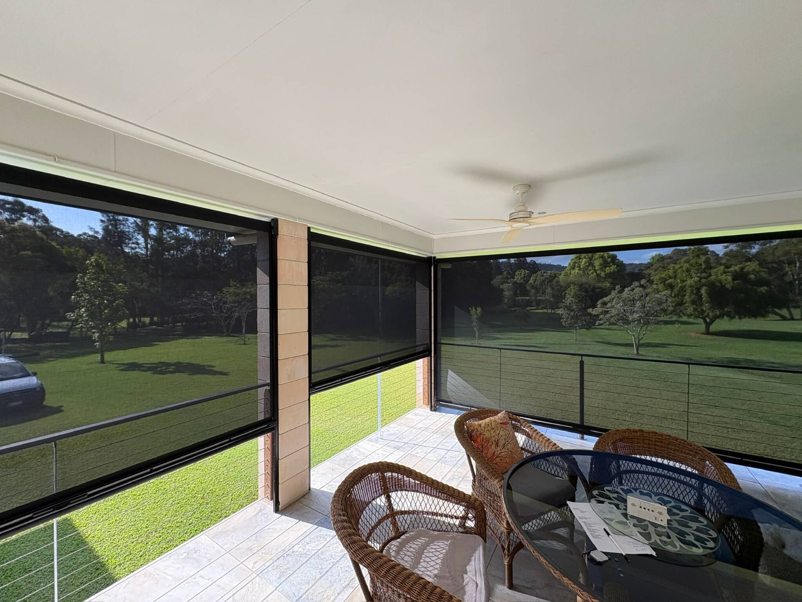 Ziptrak mesh blinds installed on a covered patio - Sunshine Coast