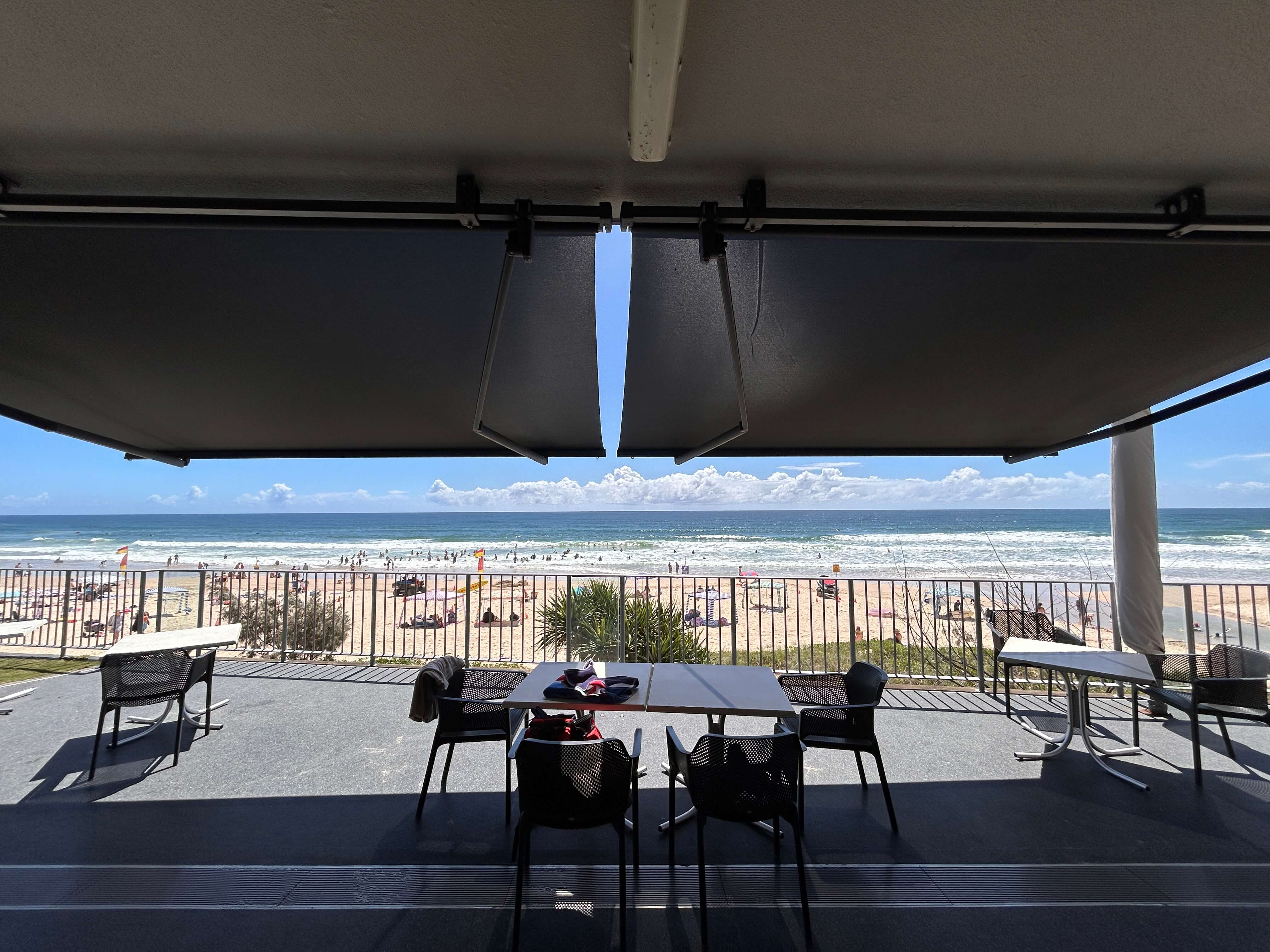 Standard folding arm awning at beachfront